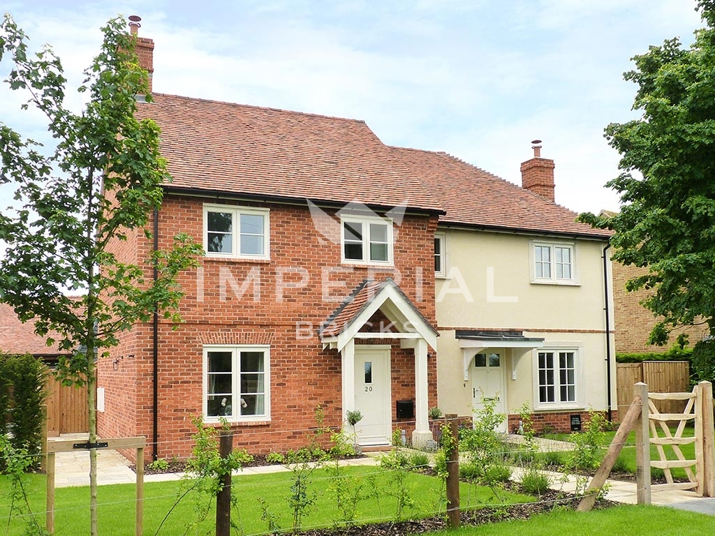 Unique development of large houses build using Farmhouse Orange handmade bricks