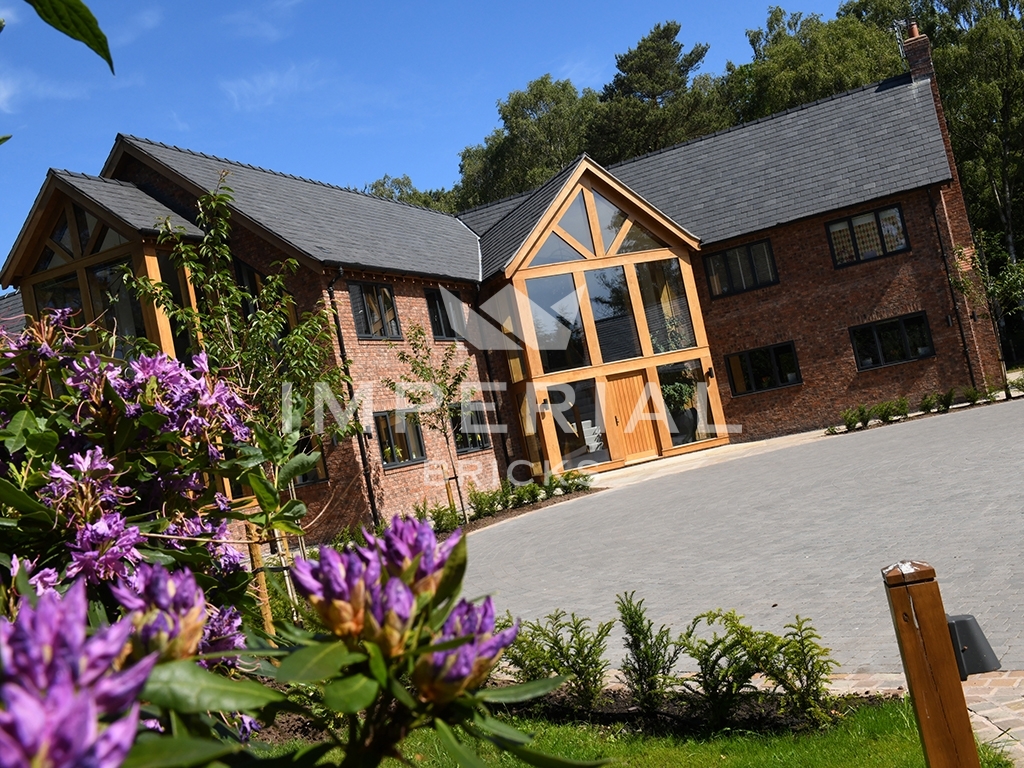 Modern stately residential home, built using Reclamation Shire Blend handmade bricks.