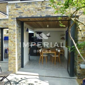 Single storey extension to the rear of a terraced town house in London, built using Weathered Original London Stock handmade bricks.