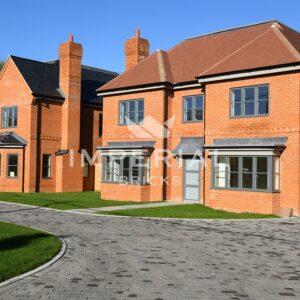 Development of detached new build homes, built using Heritage Soft Orange bricks.