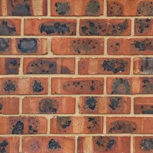 Original Giscol Common bricks shown in a wall. The bricks have a red base colour, pale banding and rough cast burnt appearance.