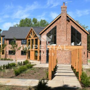 Large self-build home, built using Reclamation Shire Blend handmade bricks. The bricks are complemented with a timber frame structure and slate roof.
