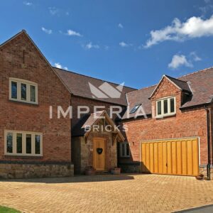 Large detached new build home built using Reclamation Shire Blend bricks. The bricks are complemented with handmade roof tiles, a natural stone porch and oak doors.