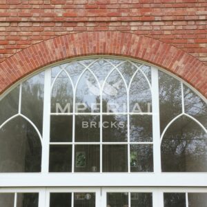 Large self-build home, built using Reclamation Soft Red handmade bricks. Image is taken close up to show the detail and texture in the brickwork