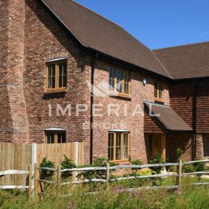 Detached new build home built using Tumbled Reclamation Red handmade bricks.