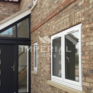 Entrance of a semi-detached extension, built using York Clamp handmade bricks.