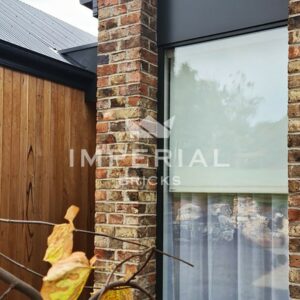 Corner of a residential new build home, built using York Clamp handmade bricks. Image taken close up to show the detail and texture in the brickwork.