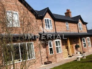Large residential new build home, built using Tumbled Reclamation Red handmade bricks.