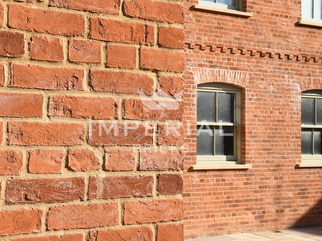 Side of the residential showing the detail in the brickwork. Built using Farmhouse Orange handmade bricks.