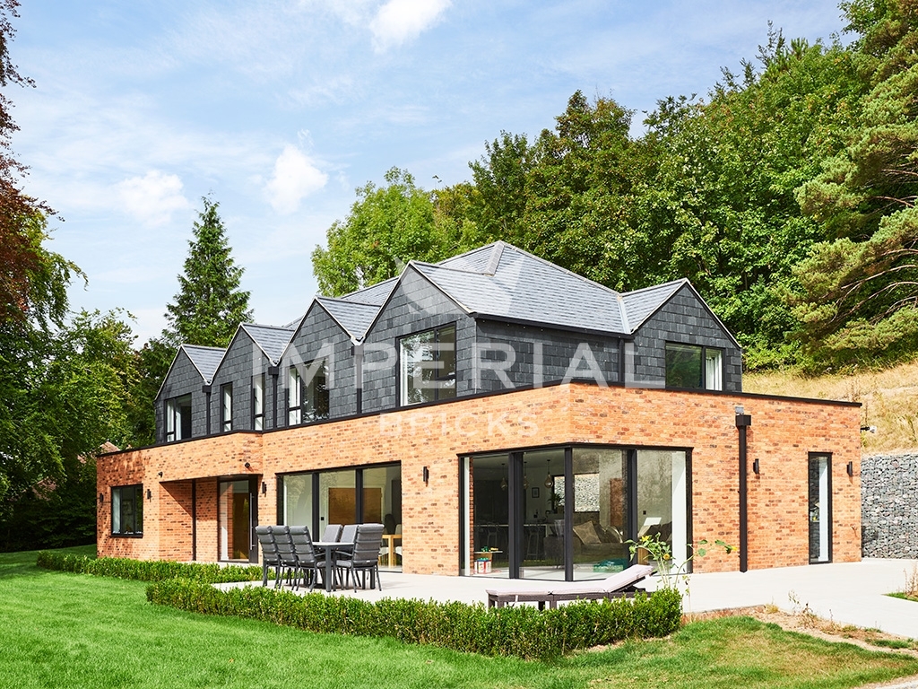 Angled view of large residential self-build, built using Country Blend handmade bricks.