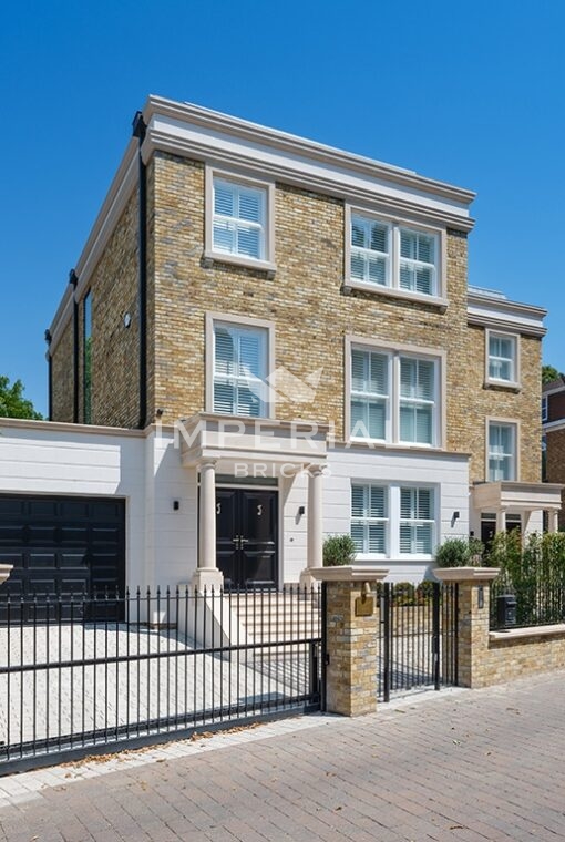 Side angle of two new build properties, built using Medium Weathered Original London Stock handmade bricks.