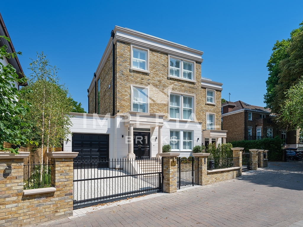 Side angle of two new build properties, built using Medium Weathered Original London Stock handmade bricks.