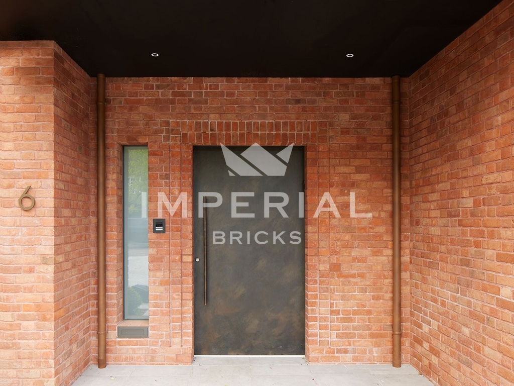 Front entrance to new build property, built using Capital Blend Soft Red handmade bricks.