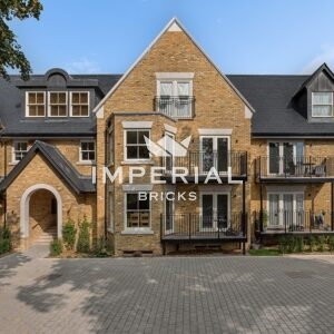 Front view of new apartment building built using Conservation Yellow Stock handmade bricks.