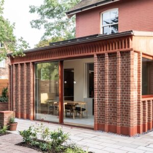 Angled garden view of new build property, built out of Soft Red handmade bricks.