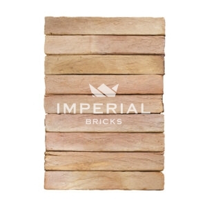 Blenheim Buff Multi elongated bricks shown in a wall, the bricks feature natural colour variations.