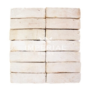 Kentwell White bricks shown in a wall, are chalky soft white shade with pink and cream undertones.