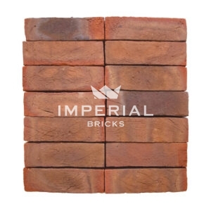 Wadhurst Multi handmade bricks shown in a wall, featuring a tonal range from red to plum, with blue flashing throughout.