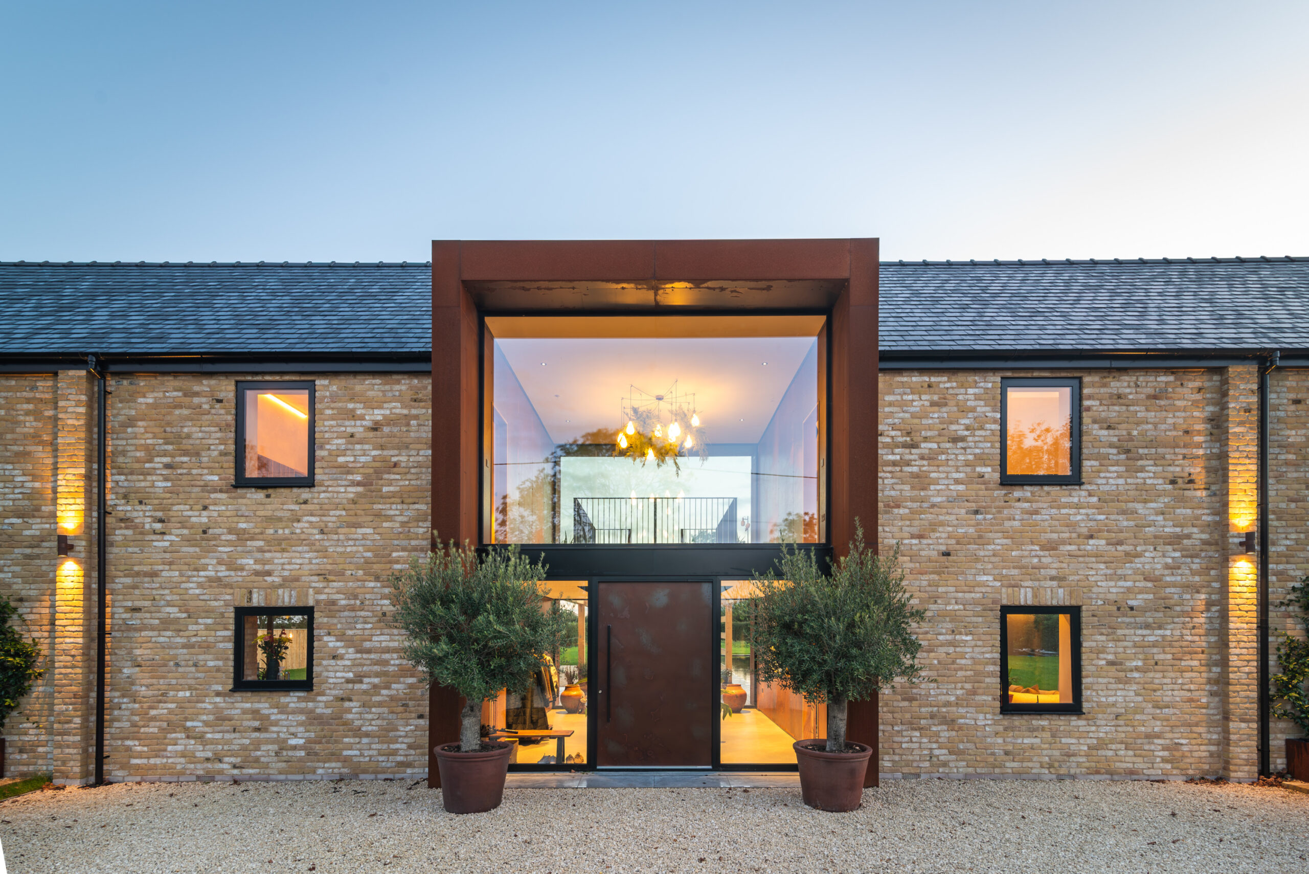 Front shot of Grand Designs property built using Tumbled Cambridge Buff handmade bricks.