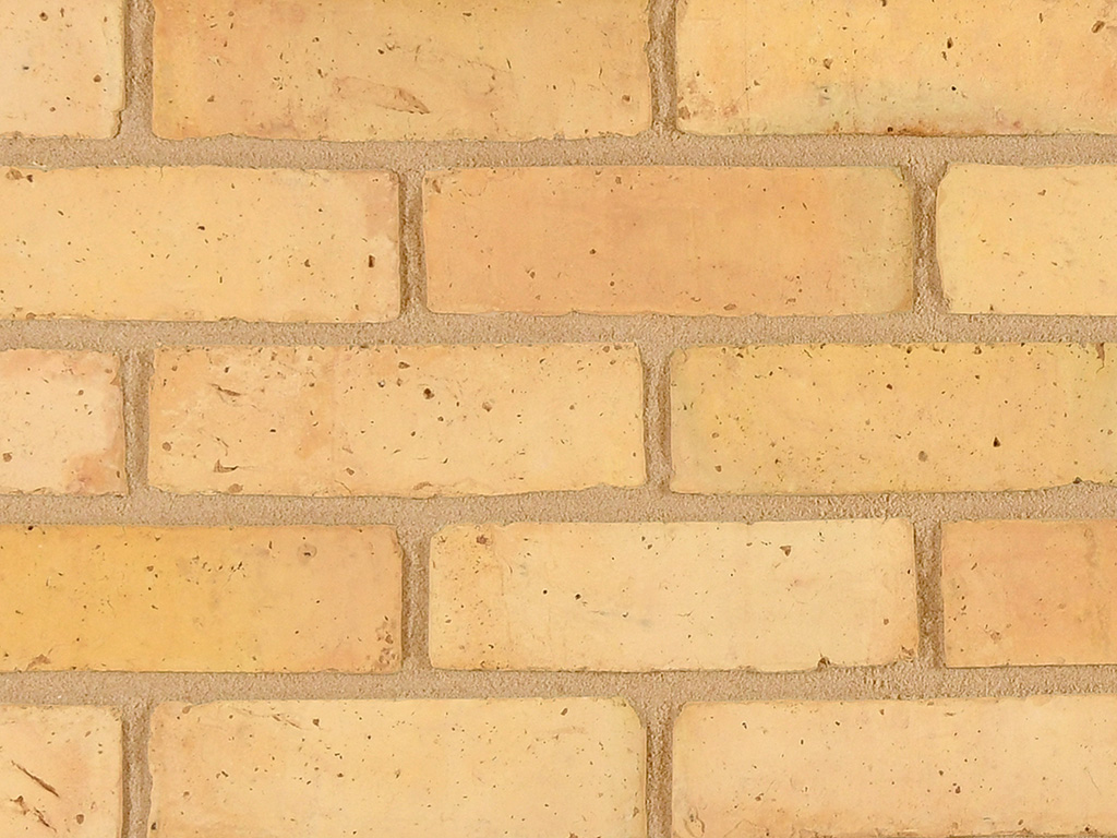 Plain Gault bricks shown in a wall up close.