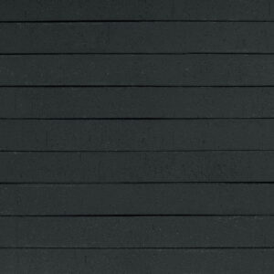 Katla Black Matt elongated bricks shown in a wall.