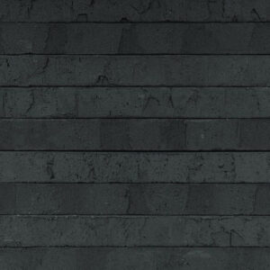 Katla Black Scratched elongated bricks shown in a wall.