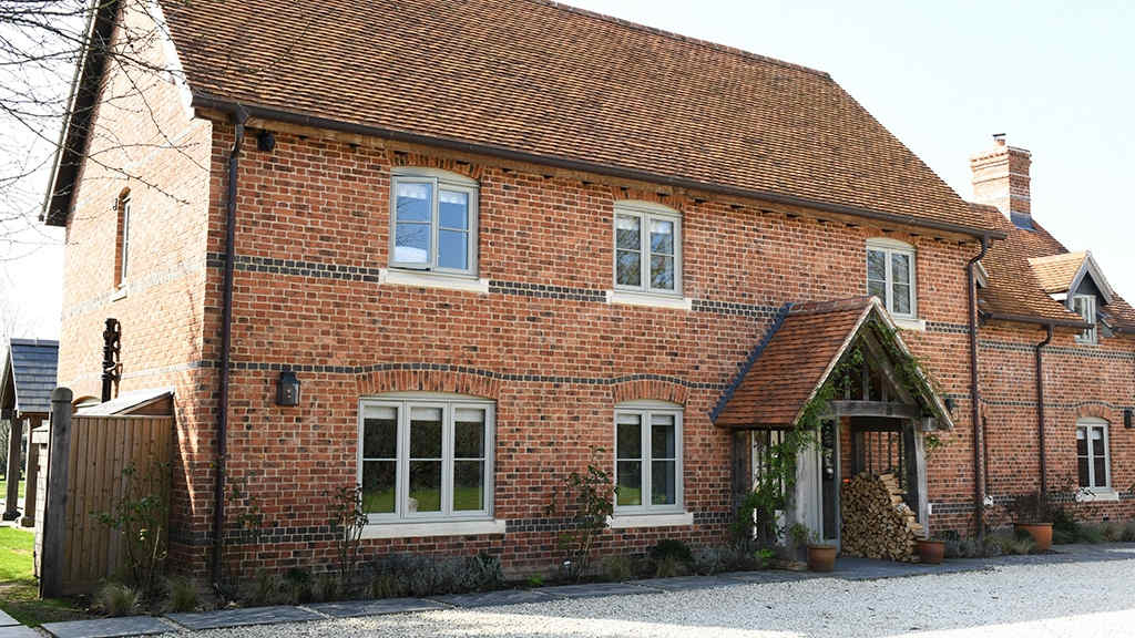 Multi-colour brickwork on a country house in the Shire Counties.