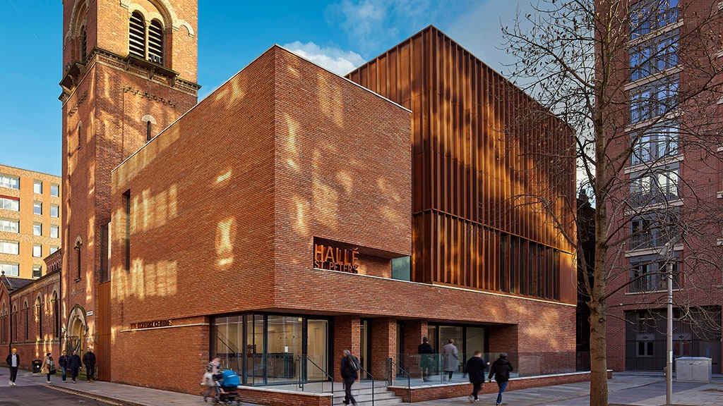 Red handmade bricks on an inner-city commercial building in the North of England.