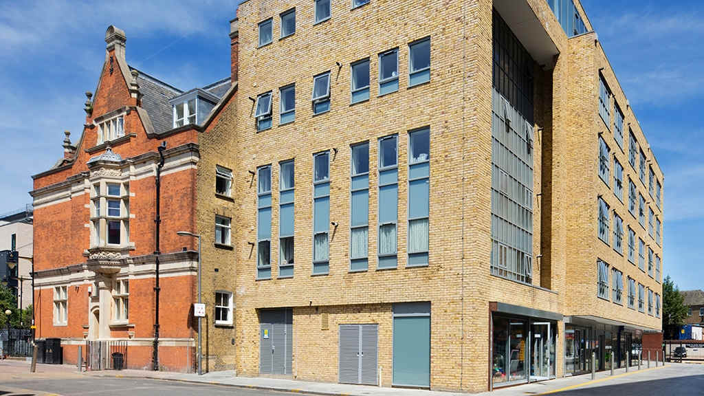 Yellow Stock bricks on converted apartment in London.