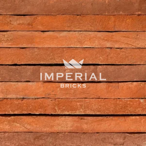 Farmhouse Orange handmade linear bricks shown in a wall.