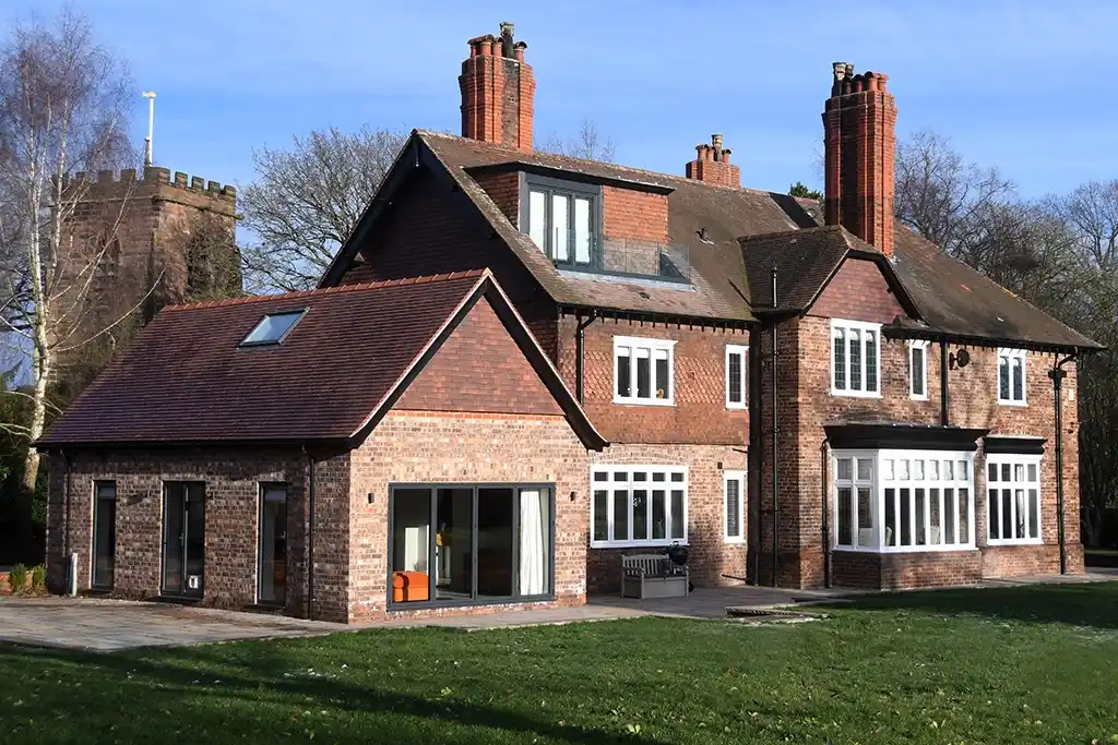 Project example of an extension and renovation of a residential home built using weathered dual faced bricks.