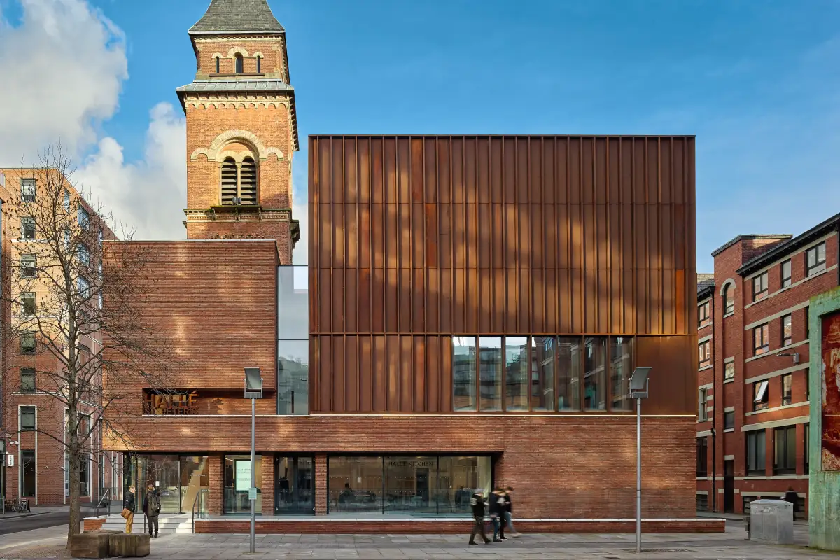 External street view of Halle St Peters in Manchester, featuring the red multi linear brickwork extension.