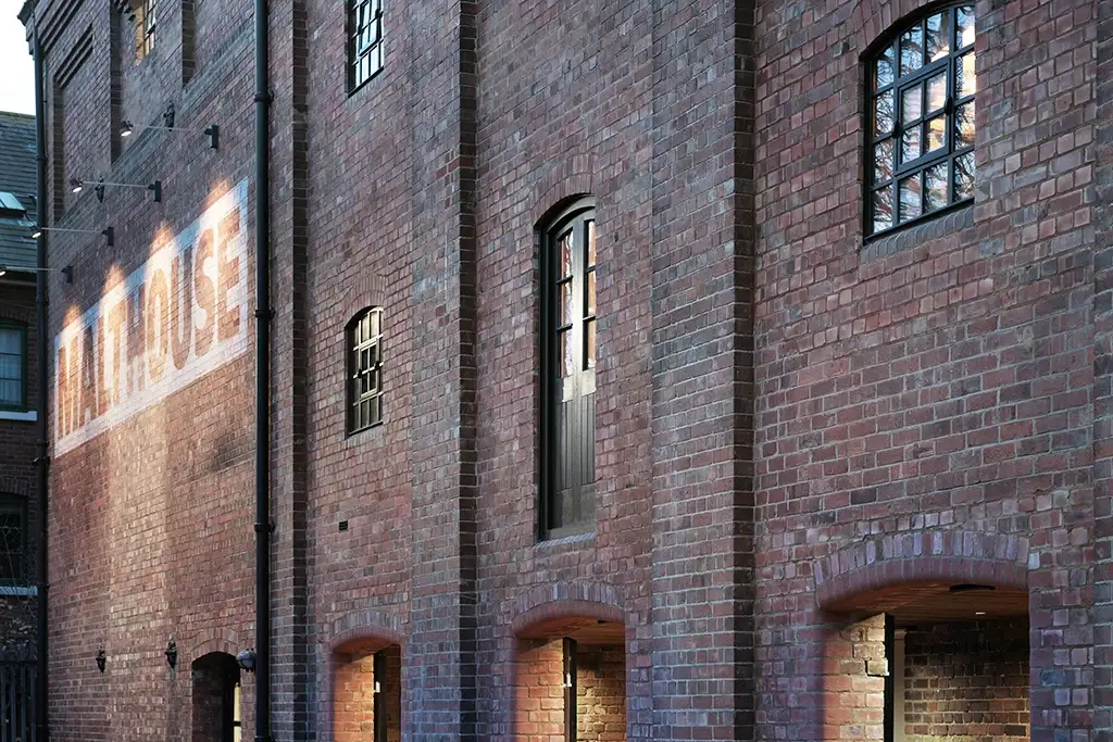 Example of a completed project using weathered bricks. The original brickwork was restored and openings filled in using custom matched weathered bricks.